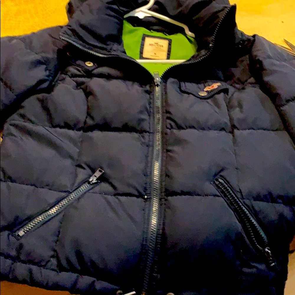 A ladies navy blue puffer winter jacket